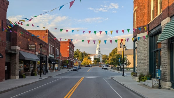 Colorful flags hung above the street in downtown Middlebury.