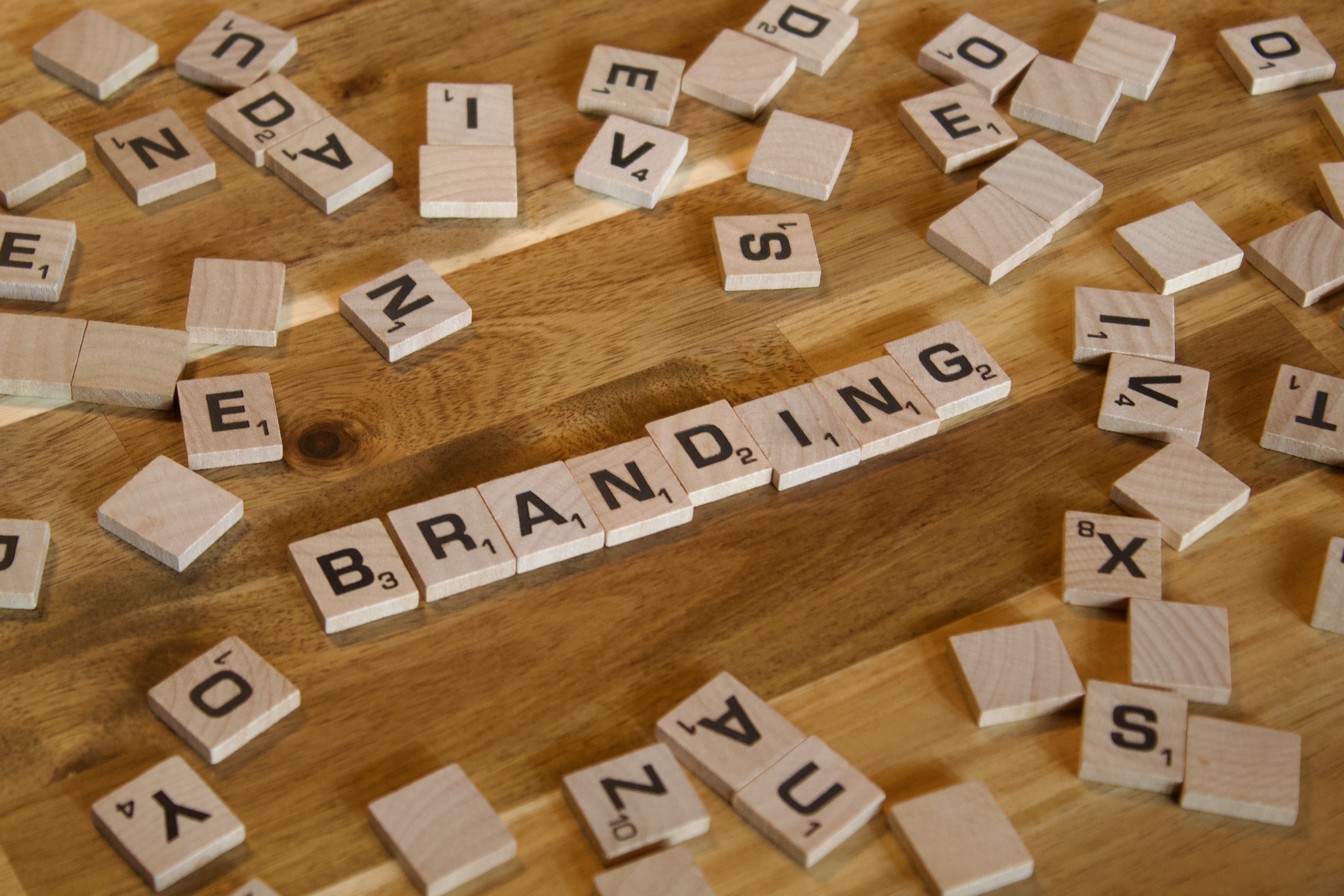 The word "Branding" spelled out in Scrabble letters